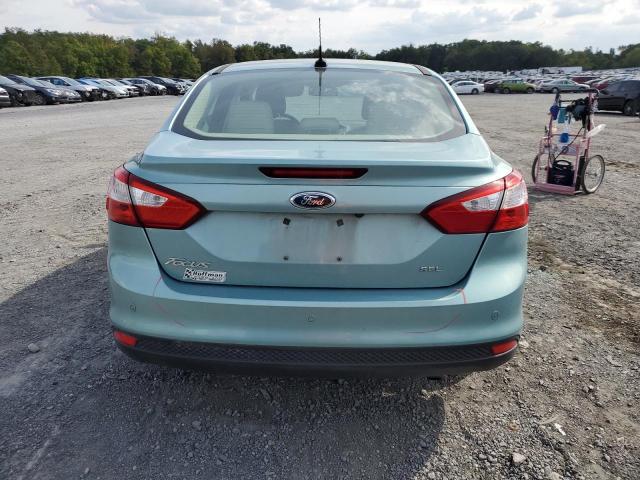 1FAHP3H27CL125317 - 2012 FORD FOCUS SEL BLUE photo 6