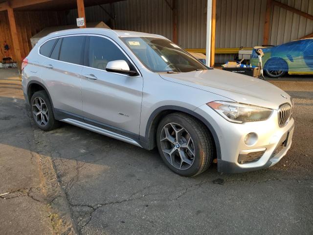 WBXHT3C32H5F71057 - 2017 BMW X1 XDRIVE28I SILVER photo 4