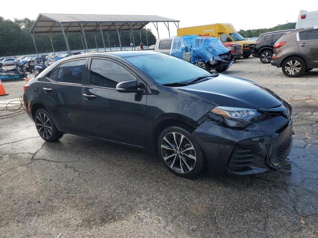 5YFBURHE3KP888303 - 2019 TOYOTA COROLLA L შავი ფოტო 4