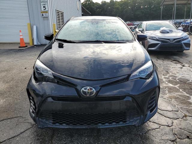 5YFBURHE3KP888303 - 2019 TOYOTA COROLLA L შავი ფოტო 5