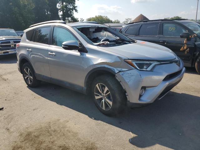 2T3WFREV1HW360869 - 2017 TOYOTA RAV4 XLE SILVER photo 4