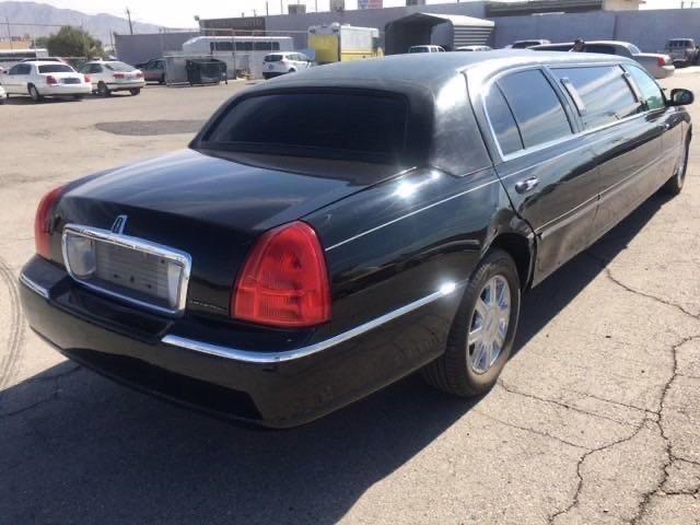 2L1FL8JW7AX602025 - 2010 LINCOLN TOWN CAR EXECUTIVE BLACK photo 4