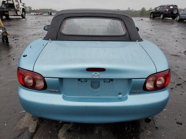 JM1NB353920229669 - 2002 MAZDA MX-5 MIATA BASE TURQUOISE photo 6