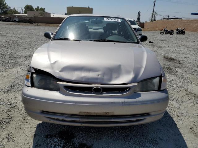 1NXBR12E7YZ376062 - 2000 TOYOTA COROLLA VE თაფლისფერი ფოტო 5