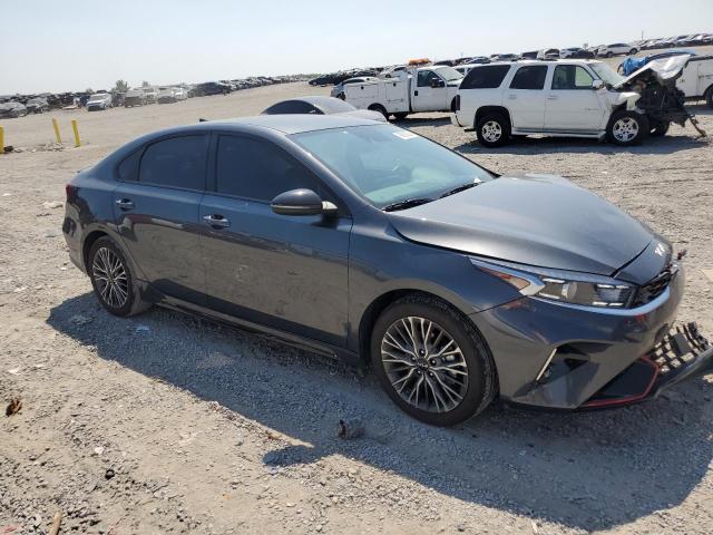 3KPF54AD7RE773119 - 2024 KIA FORTE GT LINE CHARCOAL photo 4