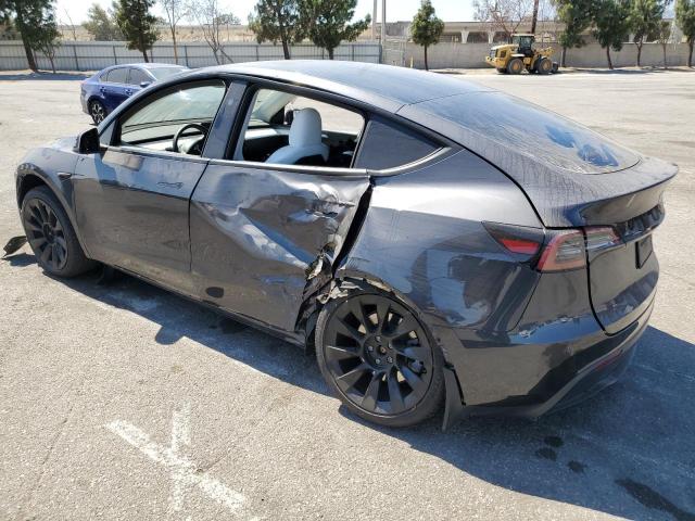 7SAYGAEE6SF243599 - 2025 TESLA MODEL Y GRAY photo 2