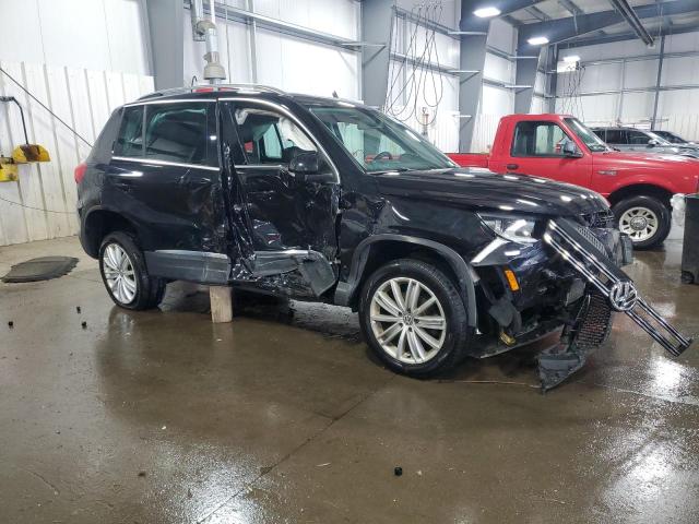 WVGBV7AX7DW556397 - 2013 VOLKSWAGEN TIGUAN S BLACK photo 4