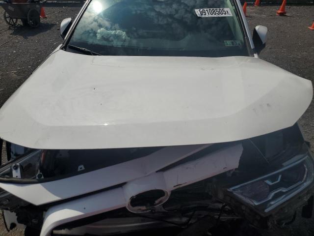 2T3RWRFV0MW128527 - 2021 TOYOTA RAV4 XLE WHITE photo 12