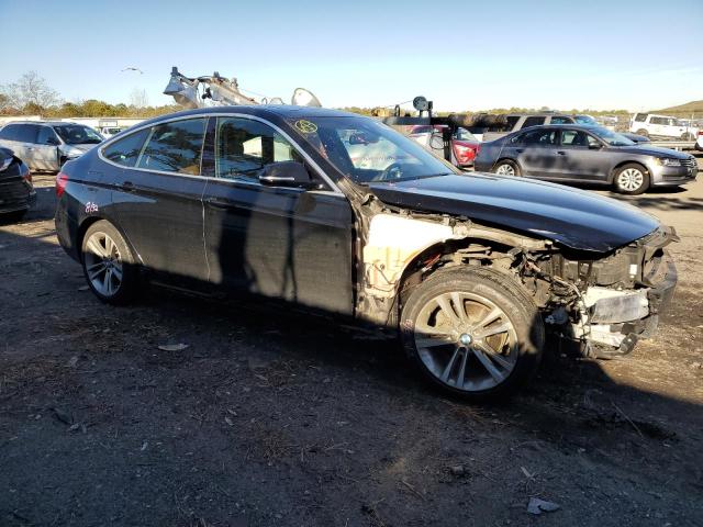 WBA8Z9C36HG827021 - 2017 BMW 330 XIGT BLACK photo 4