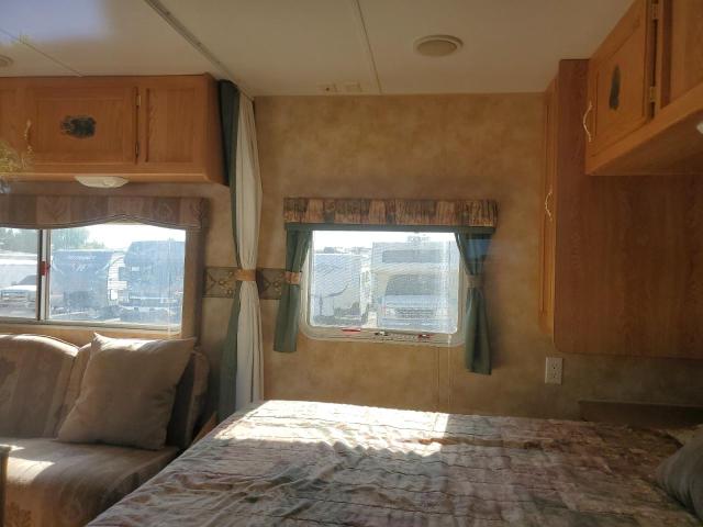 4YDT2402737308789 - 2003 KEYSTONE HORNET TWO TONE photo 5