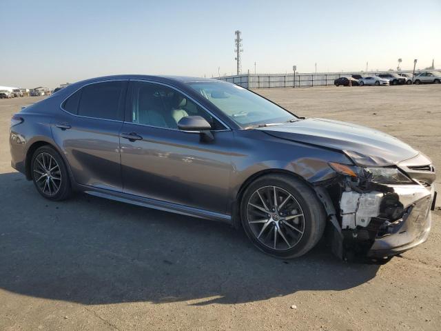 4T1S11AK7PU170124 - 2023 TOYOTA CAMRY SE NIGHT SHADE CHARCOAL photo 4