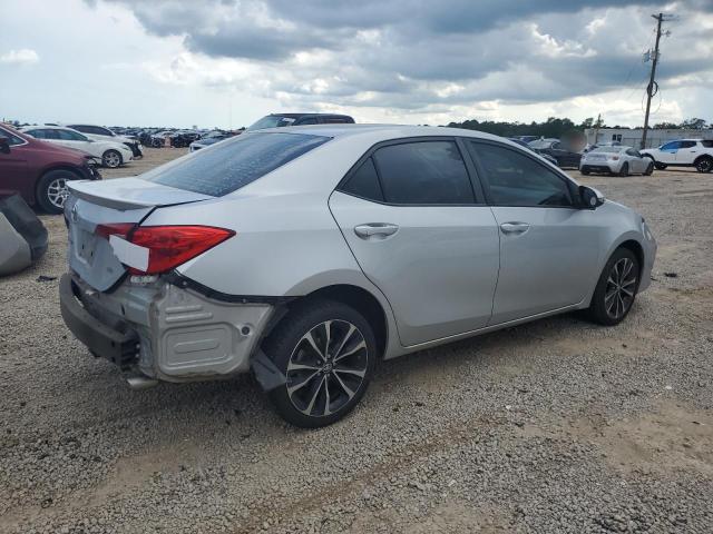 5YFBURHE1KP904773 - 2019 TOYOTA COROLLA L ვერცხლისფერი ფოტო 3