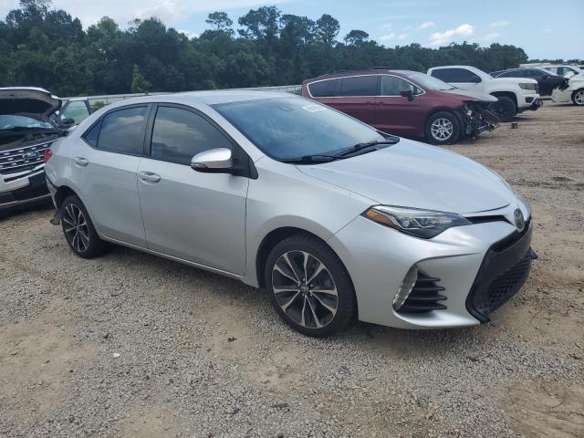 5YFBURHE1KP904773 - 2019 TOYOTA COROLLA L ვერცხლისფერი ფოტო 4