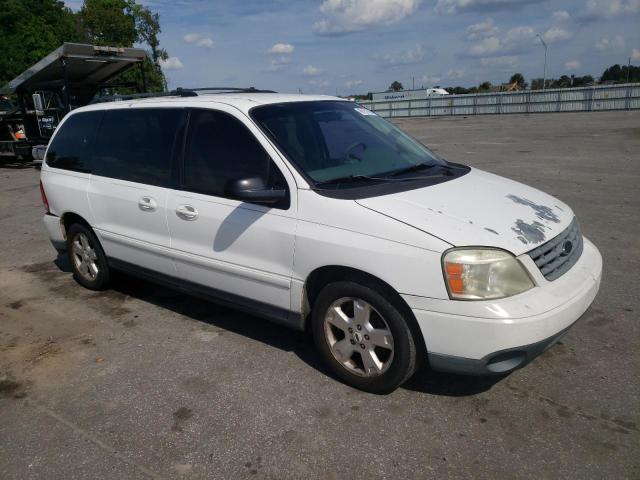 2FMZA57674BB15304 - 2004 FORD FREESTAR SES WHITE photo 4