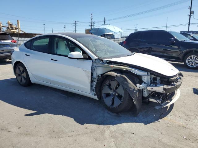 5YJ3E1EA9NF359670 - 2022 TESLA MODEL 3 WHITE photo 4