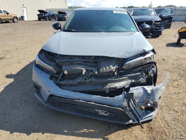 2HGFE2F51NH534168 - 2022 HONDA CIVIC SPORT BLUE photo 5