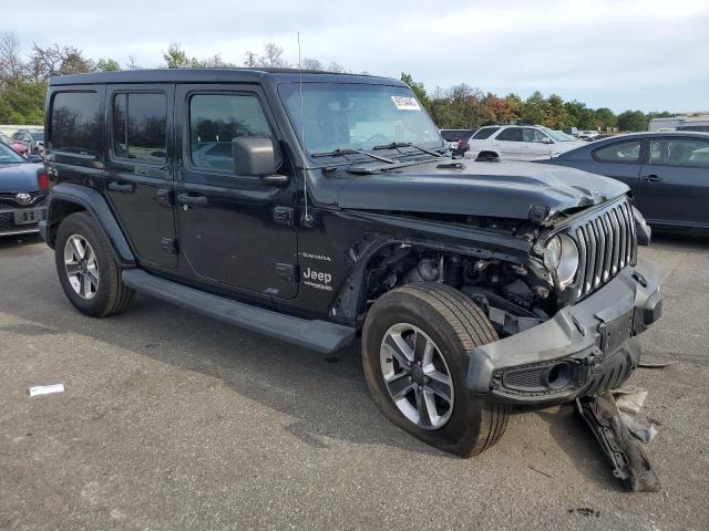 1C4HJXEG7JW263180 - 2018 JEEP WRANGLER U SAHARA შავი ფოტო 4