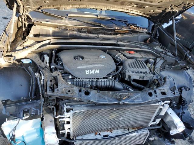 WBXHU7C3XJ5L09567 - 2018 BMW X1 SDRIVE2 BLACK photo 12