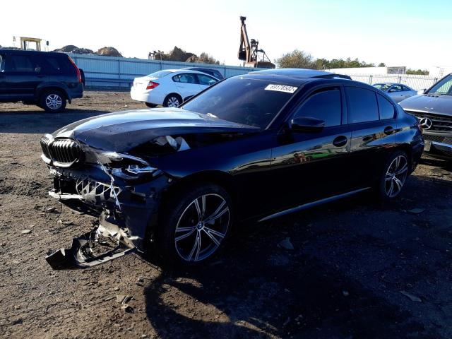 WBA5R7C56KAJ81384 - 2019 BMW 330XI Czarny zdjęcie 1