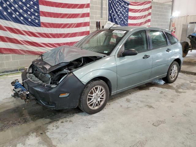 3FAFP37N75R104961 - 2005 FORD FOCUS ZX5 GRAY photo 1