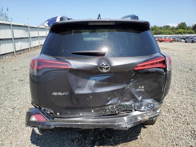 JTMBFREV5JJ257988 - 2018 TOYOTA RAV4 LE GRAY photo 6