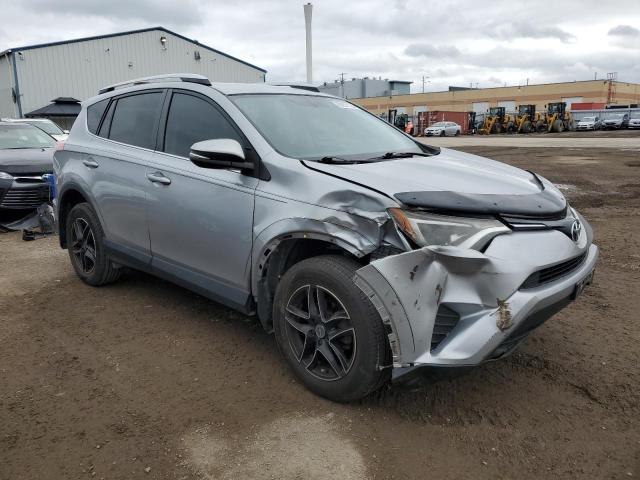 2T3ZFREV3GW282817 - 2016 TOYOTA RAV4 LE SILVER photo 4