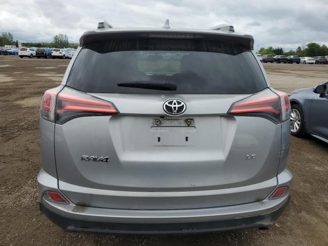 2T3ZFREV3GW282817 - 2016 TOYOTA RAV4 LE SILVER photo 6