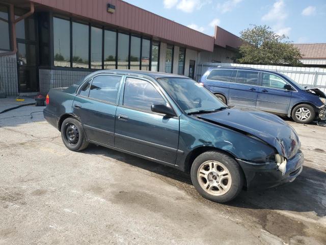 1Y1SK528XWZ425955 - 1998 CHEVROLET GEO PRIZM BASE GREEN photo 4