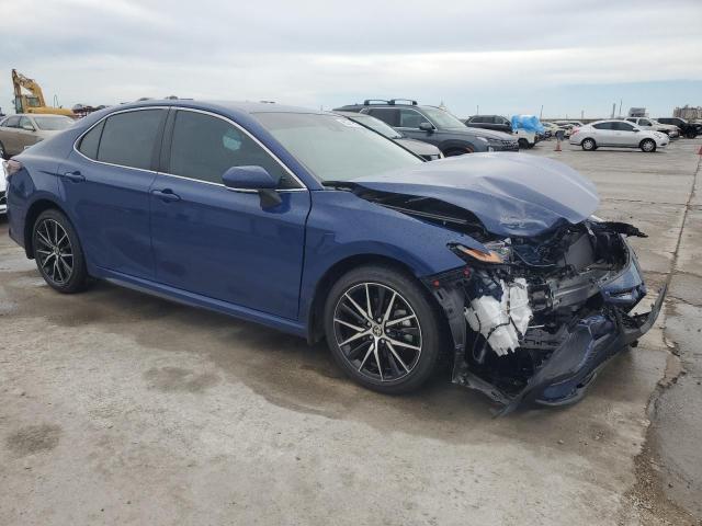 4T1G11AK4RU248321 - 2024 TOYOTA CAMRY SE NIGHT SHADE BLUE photo 4