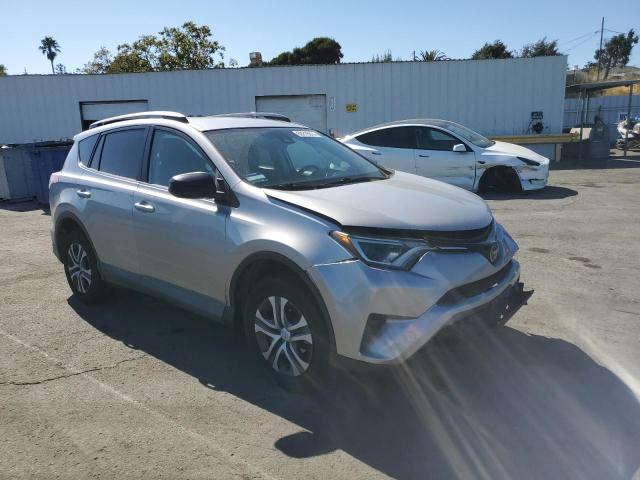 2T3ZFREV7HW341269 - 2017 TOYOTA RAV4 LE SILVER photo 4