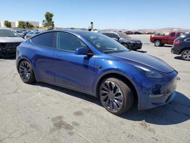 7SAYGDEF9PF697721 - 2023 TESLA MODEL Y ლურჯი ფოტო 4