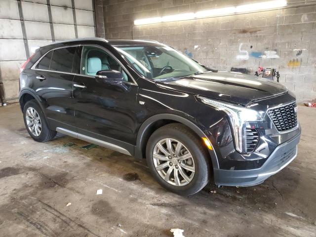 1GYFZDR42PF110983 - 2023 CADILLAC XT4 PREMIUM LUXURY BLACK photo 4