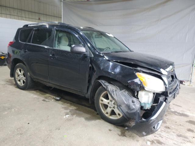 2T3BF4DVXBW095508 - 2011 TOYOTA RAV4 BLACK photo 4