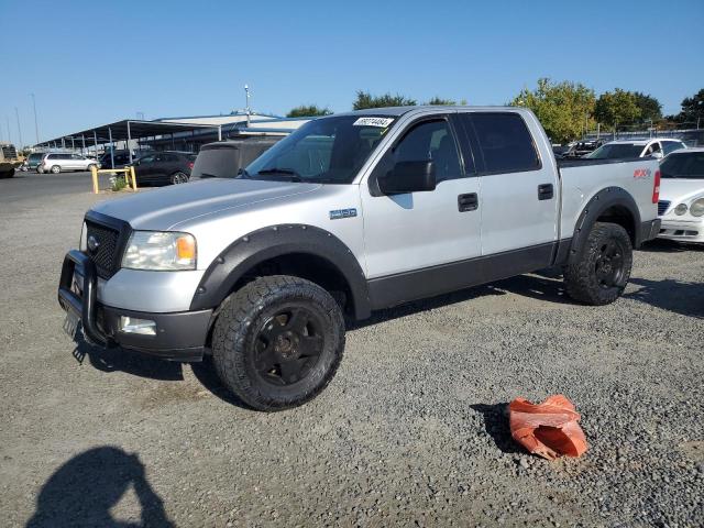 1FTPW14544FA29156 - 2004 FORD F150 SUPERCREW SILVER photo 1