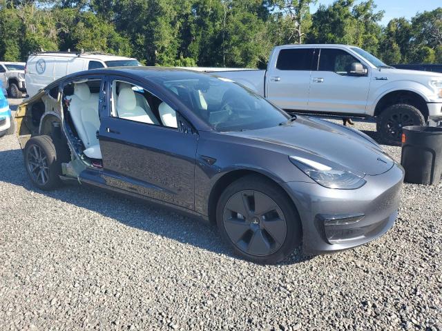 5YJ3E1EA1PF552396 - 2023 TESLA MODEL 3 Մոխրագույն լուսանկար 4
