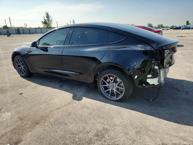 5YJ3E1EA3PF665797 - 2023 TESLA MODEL 3 Schwarz Foto 2