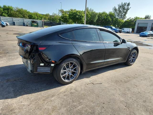 5YJ3E1EA3PF665797 - 2023 TESLA MODEL 3 Schwarz Foto 3