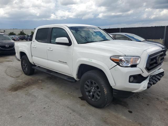 3TMAZ5CN2PM217426 - 2023 TOYOTA TACOMA DOUBLE CAB WHITE photo 4