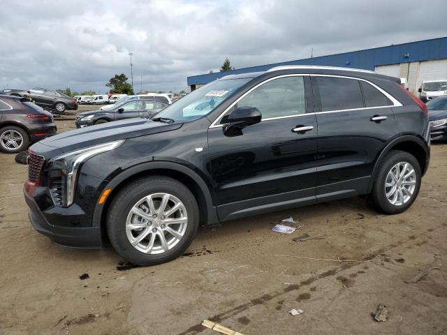 1GYFZBR49PF204962 - 2023 CADILLAC XT4 LUXURY BLACK photo 1