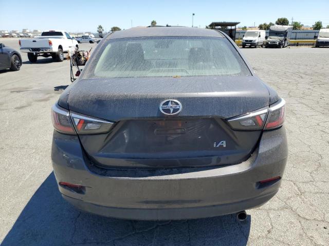 3MYDLBZV7GY136694 - 2016 TOYOTA SCION IA GRAY photo 6