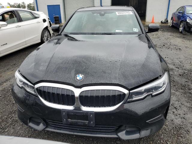 3MW5R7J08M8C06386 - 2021 BMW 330XI BLACK photo 5