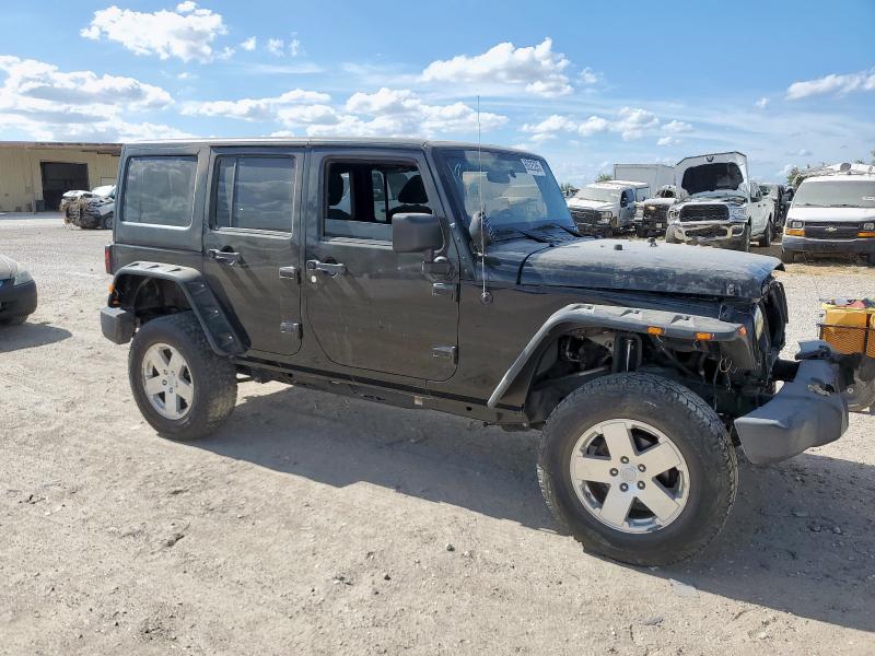 1J4BA3H15BL627700 - 2011 JEEP WRANGLER U SPORT BLACK photo 4