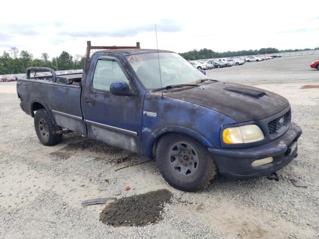 1FTFF28L7VNC23679 - 1997 FORD F250 BLUE photo 4