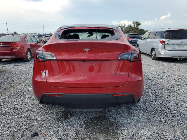 7SAYGDEE4PA178354 - 2023 TESLA MODEL Y Красный фото 6