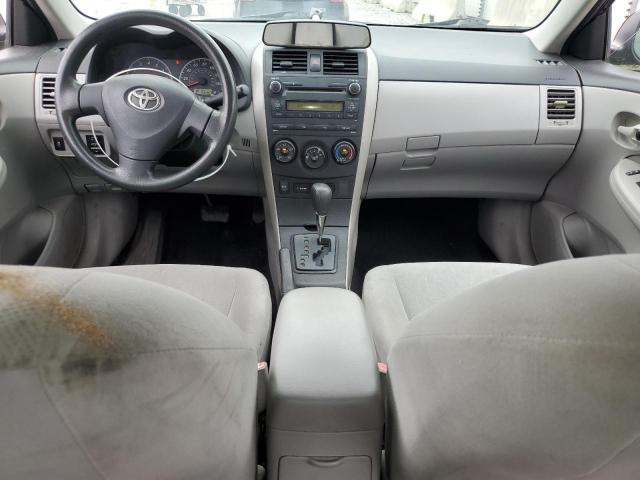 2T1BU4EE2DC946461 - 2013 TOYOTA COROLLA BASE Schwarz Foto 8