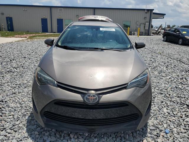 5YFBURHE8KP887650 - 2019 TOYOTA COROLLA L TAN photo 5