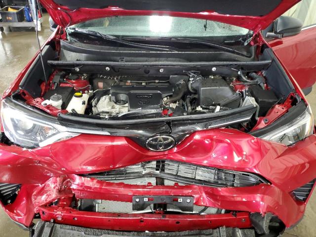 2T3BFREV3JW720437 - 2018 TOYOTA RAV4 LE RED photo 12