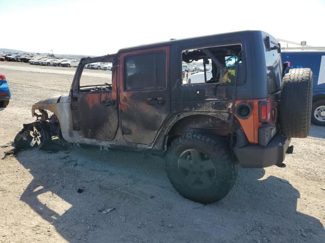 1C4BJWDG2EL298816 - 2014 JEEP WRANGLER U SPORT ORANGE photo 2