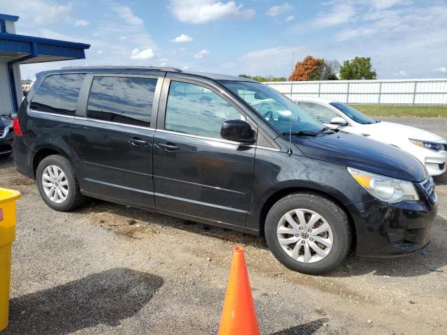 2C4RVABGXER135217 - 2014 VOLKSWAGEN ROUTAN SE BLACK photo 4