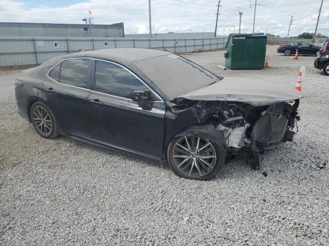 4T1T11AKXRU881498 - 2024 TOYOTA CAMRY SE NIGHT SHADE BLACK photo 4